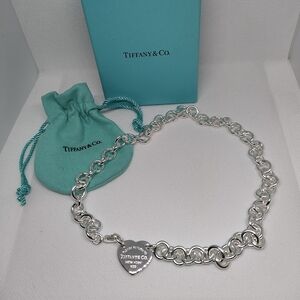 Lustrous Silver Iconic Branding Luxurious Heart Necklace